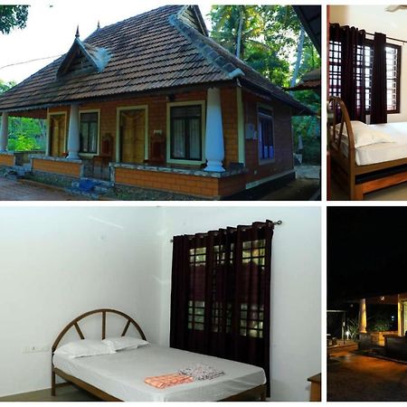 The Munroe Vibes Inn Mundrothuruth Dış mekan fotoğraf